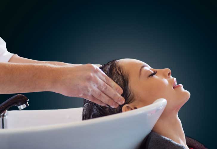 Wash hair using professional salon hair washing techniques